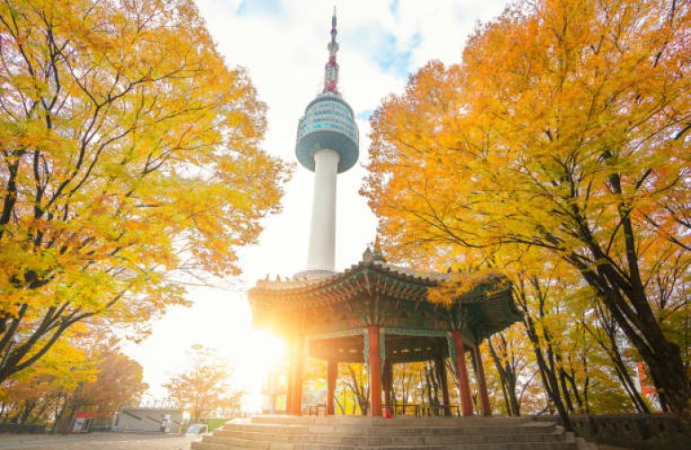 N seoul tower and chinese pavilion in autumn with morning sunrise, Seoul city, South Korea
